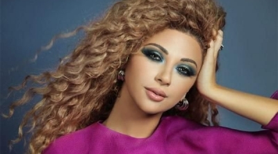 بالصور: ميريام فارس تستعرض حملها بـ''الشورت''