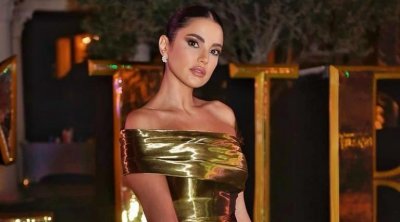 درة زروق تتألق في إطلالة بفستان ذهبي أنيق (صور) 
