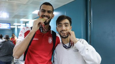 بالصور : اللجنة الوطنية الأولمبية تحتفي بخليل الجندوبي وفراس القطوسي