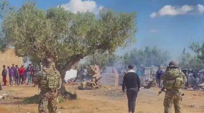 Les forces de l'ordre démantèlent un campement de migrants