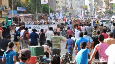 5 قتلى في اشتباكات بين أنصار مرسي ومعارضيه بالمنصورة