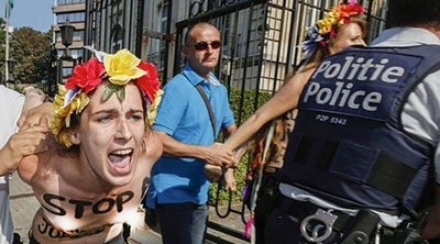 عدد من ناشطات فيمن يتعرين امام السفارة التونسية ببلجيكا 