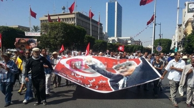 خروج مسيرات حاشدة من شارع بورقيبة للالتحاق بموكب جنازة البراهمي