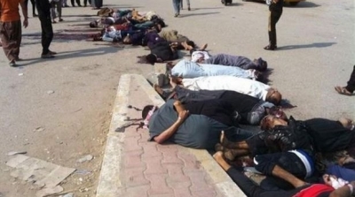 العراق : ''داعش'' تعدم 466 شخصا من عشيرة سنية من بينهم نساء و اطفال