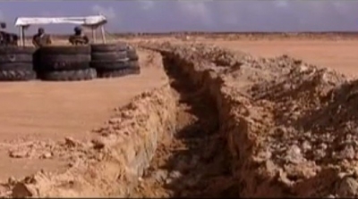  تفاصيل وكلفة الجدار الرملي على الحدود مع ليبيا
