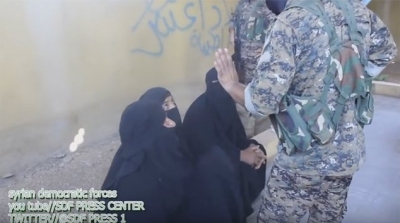 عناصر داعش يتخفون في ملابس نسائية