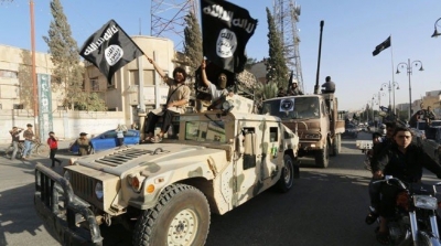 داعش يعدم احد قيادييه و 16 من مرافقيه حرقا في الموصل 