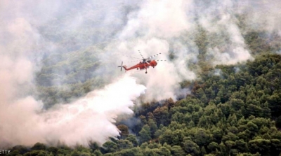 اليونان تشتبه في أعمال إجرامية تسببت بالحرائق