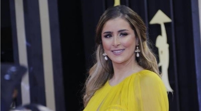 هجوم حاد على عائشة بن أحمد بسبب فستانها (صور)