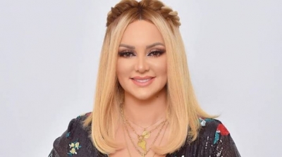 منال عمارة تصف عائشة عطية بالتافهة و الجبانة (صور)