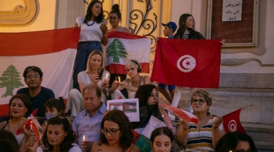 بالصور : وقفة تضامنية مع ضحايا مرفأ بيروت في شارع الحبيب بورقيبة